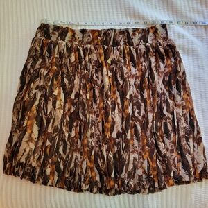 New York & Company pleated short skirt. Brown, gold, and nude. Size Medium